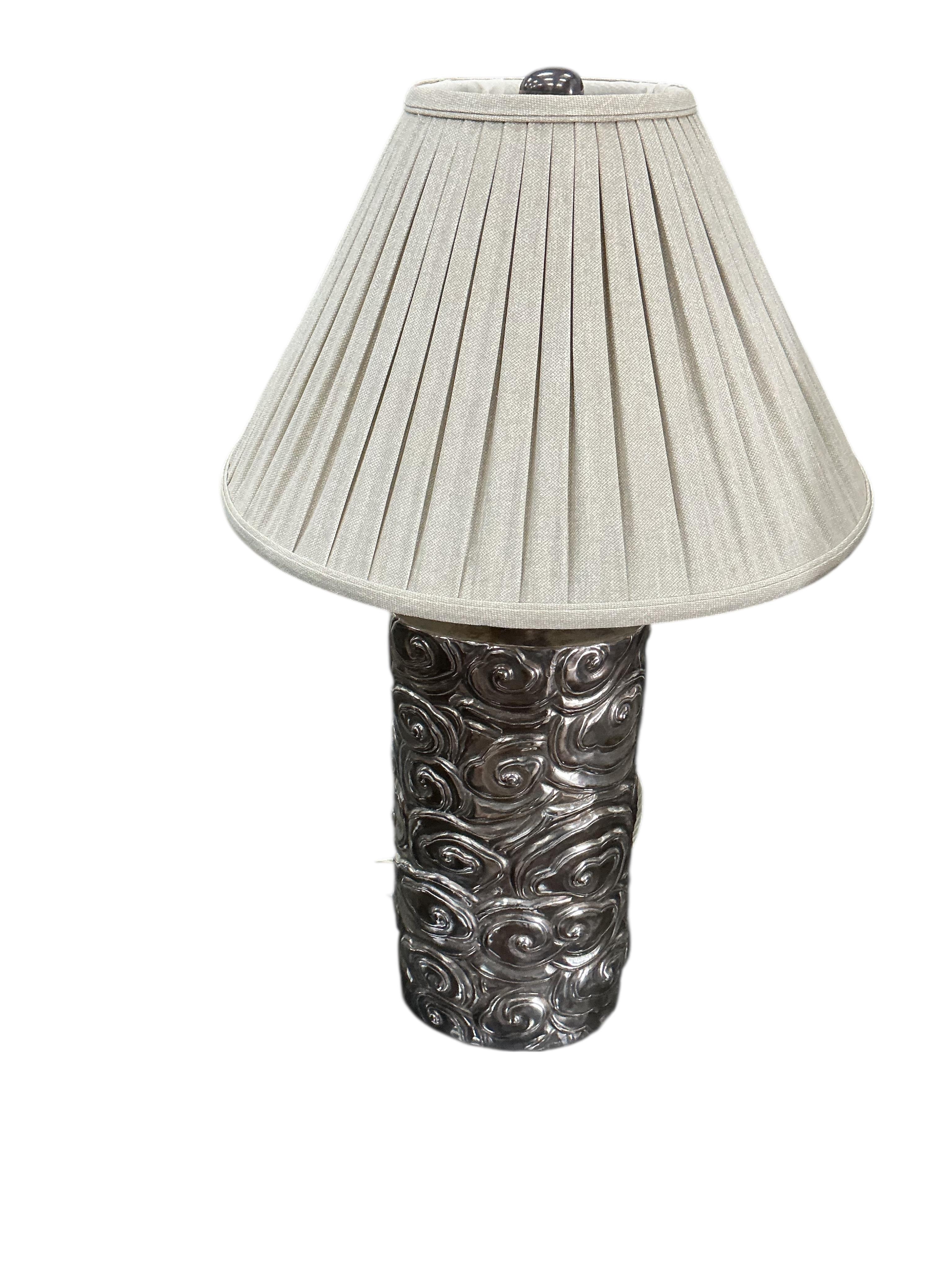 A pair of Robert Kuo Collection McGuire repousse table lamps with quilted shades, height 78cm